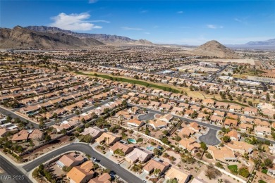 Nestled in a quiet cul-de-sac in Sun City Summerlin, this home on Highland Falls Golf Club in Nevada - for sale on GolfHomes.com, golf home, golf lot