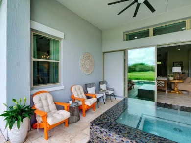 Step into luxury living in the heart of Lake Nona's prestigious on Eagle Creek Golf Club in Florida - for sale on GolfHomes.com, golf home, golf lot