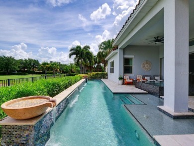 Step into luxury living in the heart of Lake Nona's prestigious on Eagle Creek Golf Club in Florida - for sale on GolfHomes.com, golf home, golf lot
