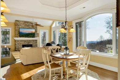 Thoughtfully designed and beautifully updated, this charming on The Cliffs at Glassy Golf and Country Club in South Carolina - for sale on GolfHomes.com, golf home, golf lot