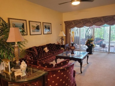 This is a MUST SEE....waiting on your personal touches. Exterior on Stonegate Golf Club in Florida - for sale on GolfHomes.com, golf home, golf lot