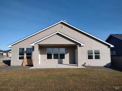 This incredible home features a beautiful kitchen with quartz on Hunters Point Golf Club in Idaho - for sale on GolfHomes.com, golf home, golf lot