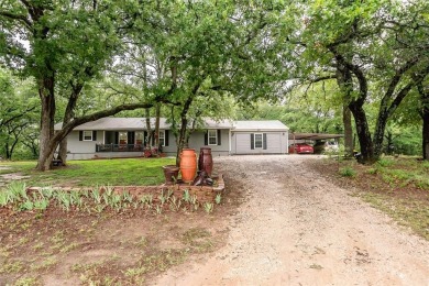 MOTIVATED SELLERS! This charming pier and beam retreat in Nocona on Nocona Hills Golf Course in Texas - for sale on GolfHomes.com, golf home, golf lot