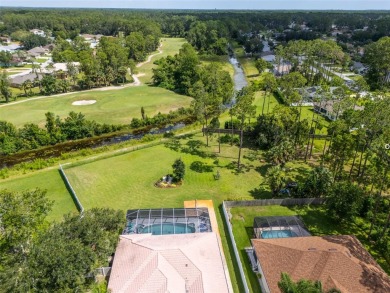You will not find another property like this in Palm Coast! on The Grand Club Cypress Course in Florida - for sale on GolfHomes.com, golf home, golf lot