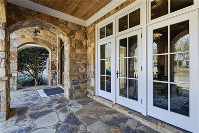 Discover the epitome of luxury and elegance in the gated TPC on TPC At Sugarloaf Golf Club in Georgia - for sale on GolfHomes.com, golf home, golf lot