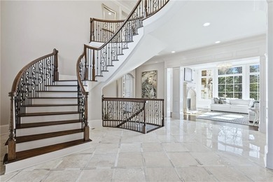 Discover the epitome of luxury and elegance in the gated TPC on TPC At Sugarloaf Golf Club in Georgia - for sale on GolfHomes.com, golf home, golf lot