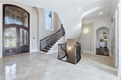 Discover the epitome of luxury and elegance in the gated TPC on TPC At Sugarloaf Golf Club in Georgia - for sale on GolfHomes.com, golf home, golf lot