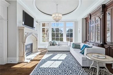 Discover the epitome of luxury and elegance in the gated TPC on TPC At Sugarloaf Golf Club in Georgia - for sale on GolfHomes.com, golf home, golf lot