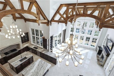 Discover the epitome of luxury and elegance in the gated TPC on TPC At Sugarloaf Golf Club in Georgia - for sale on GolfHomes.com, golf home, golf lot