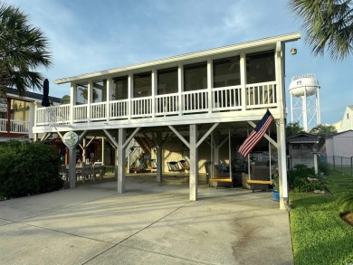 404 29th Ave. N., North Myrtle Beach, SC 29582 4 Bedrooms | 2 on Beachwood Golf Club in South Carolina - for sale on GolfHomes.com, golf home, golf lot