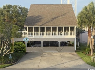 404 29th Ave. N., North Myrtle Beach, SC 29582 4 Bedrooms | 2 on Beachwood Golf Club in South Carolina - for sale on GolfHomes.com, golf home, golf lot
