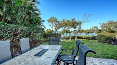 Located within the gated Queens Harbour enclave in Bay Isles on Longboat Key Golf Club Resort in Florida - for sale on GolfHomes.com, golf home, golf lot