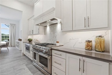 Stunning luxury coastal living in the highly sought-after Marsh on The Golf Club At Fiddlers Creek in Florida - for sale on GolfHomes.com, golf home, golf lot