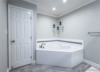 Assumable VA loan available at an amazing 2.5%! Enjoy golf on Kings Grant Golf and Country Club in North Carolina - for sale on GolfHomes.com, golf home, golf lot