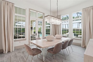 Stunning luxury coastal living in the highly sought-after Marsh on The Golf Club At Fiddlers Creek in Florida - for sale on GolfHomes.com, golf home, golf lot