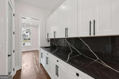Experience modern luxury in this newly built custom farmhouse on East Lake Golf Club in Georgia - for sale on GolfHomes.com, golf home, golf lot