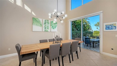 Located within the gated Queens Harbour enclave in Bay Isles on Longboat Key Golf Club Resort in Florida - for sale on GolfHomes.com, golf home, golf lot