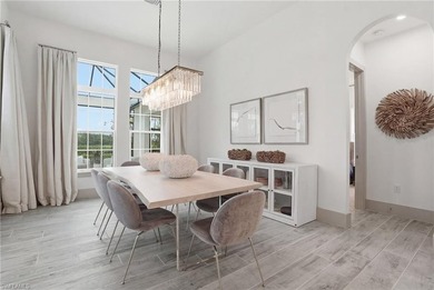 Stunning luxury coastal living in the highly sought-after Marsh on The Golf Club At Fiddlers Creek in Florida - for sale on GolfHomes.com, golf home, golf lot