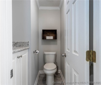 Assumable VA loan available at an amazing 2.5%! Enjoy golf on Kings Grant Golf and Country Club in North Carolina - for sale on GolfHomes.com, golf home, golf lot