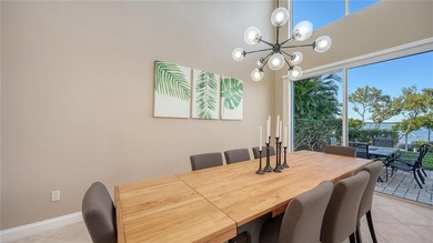 Located within the gated Queens Harbour enclave in Bay Isles on Longboat Key Golf Club Resort in Florida - for sale on GolfHomes.com, golf home, golf lot