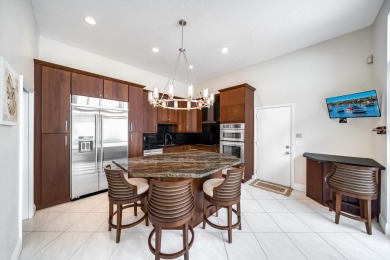 Welcome to this stunning 2-Story Courtyard Pool Home with 3 on The Boca Country Club in Florida - for sale on GolfHomes.com, golf home, golf lot