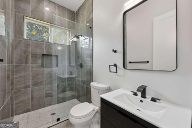 Experience modern luxury in this newly built custom farmhouse on East Lake Golf Club in Georgia - for sale on GolfHomes.com, golf home, golf lot