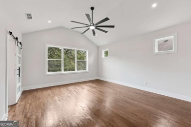 Experience modern luxury in this newly built custom farmhouse on East Lake Golf Club in Georgia - for sale on GolfHomes.com, golf home, golf lot