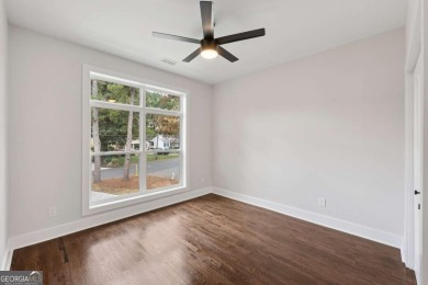 Experience modern luxury in this newly built custom farmhouse on East Lake Golf Club in Georgia - for sale on GolfHomes.com, golf home, golf lot