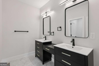 Experience modern luxury in this newly built custom farmhouse on East Lake Golf Club in Georgia - for sale on GolfHomes.com, golf home, golf lot