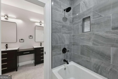Experience modern luxury in this newly built custom farmhouse on East Lake Golf Club in Georgia - for sale on GolfHomes.com, golf home, golf lot