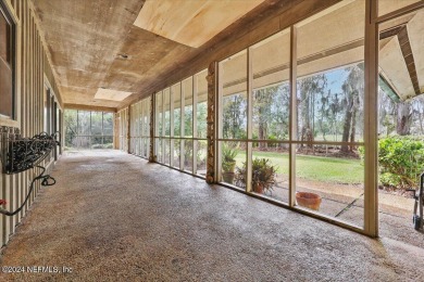 Architect Louis Holloway designed this spacious single-family on The Deerwood Country Club in Florida - for sale on GolfHomes.com, golf home, golf lot