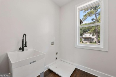 Experience modern luxury in this newly built custom farmhouse on East Lake Golf Club in Georgia - for sale on GolfHomes.com, golf home, golf lot