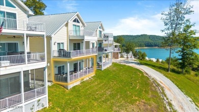Experience elevated lake living in Deerfield Resort. Built in on The Greens at Deerfield in Tennessee - for sale on GolfHomes.com, golf home, golf lot