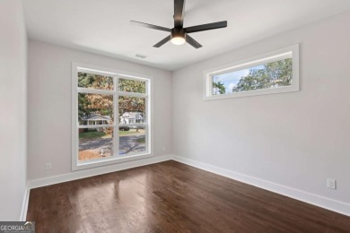 Experience modern luxury in this newly built custom farmhouse on East Lake Golf Club in Georgia - for sale on GolfHomes.com, golf home, golf lot