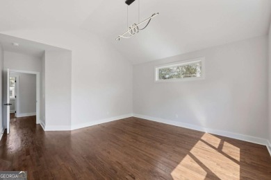 Experience modern luxury in this newly built custom farmhouse on East Lake Golf Club in Georgia - for sale on GolfHomes.com, golf home, golf lot