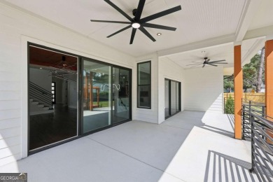 Experience modern luxury in this newly built custom farmhouse on East Lake Golf Club in Georgia - for sale on GolfHomes.com, golf home, golf lot