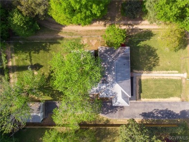 Discover the perfect blend of classic charm and modern elegance on Jefferson Lakeside Country Club in Virginia - for sale on GolfHomes.com, golf home, golf lot