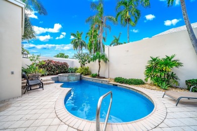 Welcome to this stunning 2-Story Courtyard Pool Home with 3 on The Boca Country Club in Florida - for sale on GolfHomes.com, golf home, golf lot