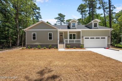 The Nautilus Floor Plan by Treweek Construction is a raised on Harbour Point Golf Club in North Carolina - for sale on GolfHomes.com, golf home, golf lot