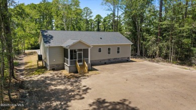 The Nautilus Floor Plan by Treweek Construction is a raised on Harbour Point Golf Club in North Carolina - for sale on GolfHomes.com, golf home, golf lot