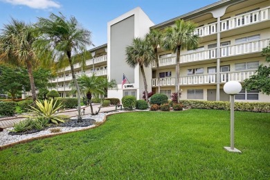Presenting Victoria's Beauty - Your Move-In Ready Paradise! Step on Wynmoor Golf Course in Florida - for sale on GolfHomes.com, golf home, golf lot