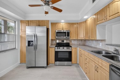 Presenting Victoria's Beauty - Your Move-In Ready Paradise! Step on Wynmoor Golf Course in Florida - for sale on GolfHomes.com, golf home, golf lot