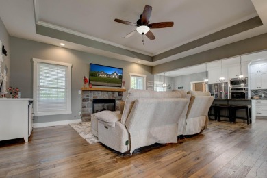 This elegant ranch on a basement offers refined main-level on Winchester Country Club, Inc. in Kentucky - for sale on GolfHomes.com, golf home, golf lot
