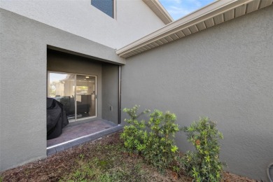 Charming Interior Unit Townhome with Courtyard Views in on Orange County National Golf Center and Lodge in Florida - for sale on GolfHomes.com, golf home, golf lot