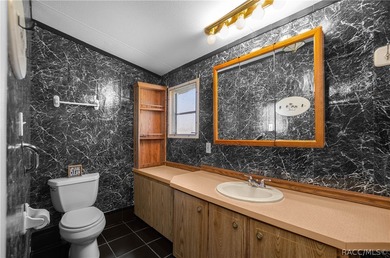 This 2 bedroom, 2 bathroom doublewide mobile home (1988) is on Inverness Golf and Country Club in Florida - for sale on GolfHomes.com, golf home, golf lot