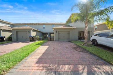 Charming Interior Unit Townhome with Courtyard Views in on Orange County National Golf Center and Lodge in Florida - for sale on GolfHomes.com, golf home, golf lot