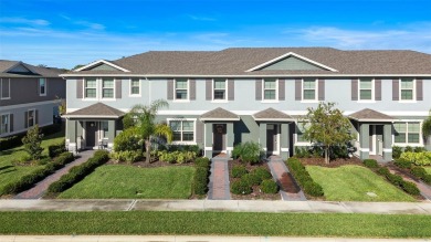 Charming Interior Unit Townhome with Courtyard Views in on Orange County National Golf Center and Lodge in Florida - for sale on GolfHomes.com, golf home, golf lot