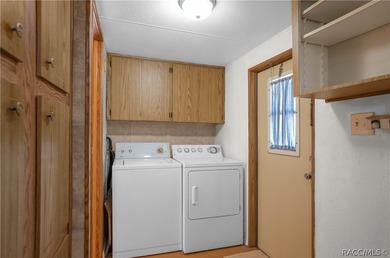 This 2 bedroom, 2 bathroom doublewide mobile home (1988) is on Inverness Golf and Country Club in Florida - for sale on GolfHomes.com, golf home, golf lot