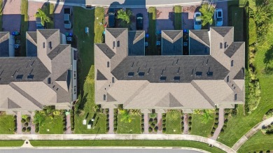 Charming Interior Unit Townhome with Courtyard Views in on Orange County National Golf Center and Lodge in Florida - for sale on GolfHomes.com, golf home, golf lot