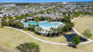 Charming Interior Unit Townhome with Courtyard Views in on Orange County National Golf Center and Lodge in Florida - for sale on GolfHomes.com, golf home, golf lot